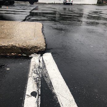 Oconee East Diner - Look closely very good job of lining up black top to walkway entrance - Diners Near Me - Islip, New York