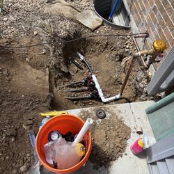 Gonzalez Sprinklers - New backflow preventer setup so basement window egress can be added in the future. Replaced manual valves with automatic.