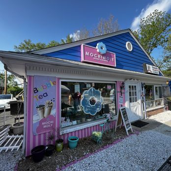 Mochimoly - a blue and pink building with a sign that says mochimoly - Donuts Near Me - Park Ridge, New Jersey