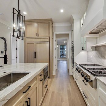 Victory Home Remodeling - a galley kitchen with marble countertops - General Contractors Near Me - Bellevue, Washington Victory Home Remodeling - a galley kitchen with marble countertops - General Contractors Near Me - Bellevue, Washington