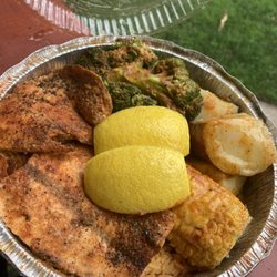 Freddy's Crab House - Salmon Dinner (baked + spicy) with potatoes, broccoli, corn, and lemon+butter on the side