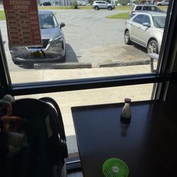 Kyoto Sushi & Teppanyaki - The misaligned parking spots and the parking bumpers.
