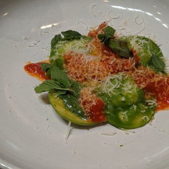SPQR - Pecorino cheese ravioli, charred tomato braised tripe, mint pesto - Italian Near Me - San Francisco, California SPQR - Pecorino cheese ravioli, charred tomato braised tripe, mint pesto - Italian Near Me - San Francisco, California