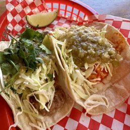 The refried beans taco and the tofu taco, both with no cheese, easy sour cream. Light, fresh & filling! The refried beans taco and the tofu taco, both with no cheese, easy sour cream. Light, fresh & filling!
