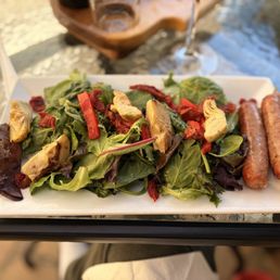 Artichoke salad and side of sausage