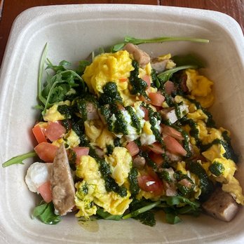 Marketplace Kitchen Table - Fluffy eggs with goat cheese and a fresh basil pesto over greens. - Burgers Near Me - Great Barrington, Massachusetts