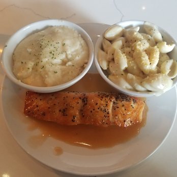 Dish Society - It's a yellow day! Farmer's plate: Salmon with Gouda grits and Truffle Mac. - Breakfast & Brunch Near Me - Houston, Texas
