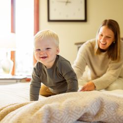 Happy moments at home on a Millwest Amish Furniture bed.