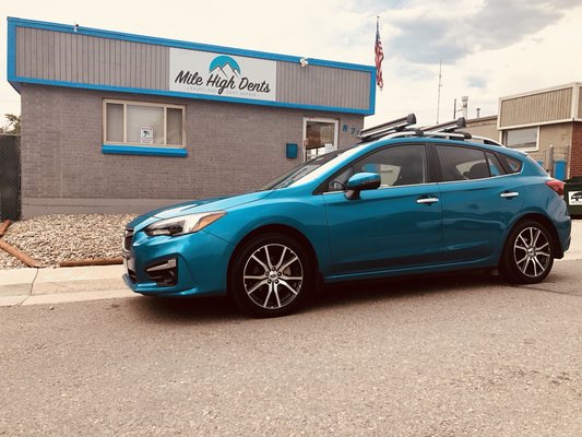 Mile High Dents | Paintless Dent Repair by null