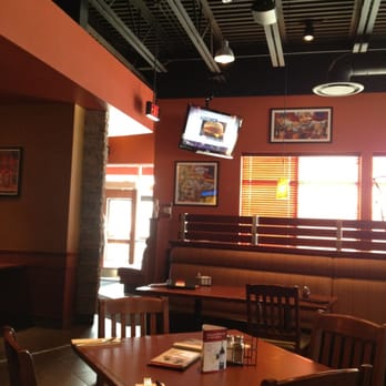 Boston Pizza - a dining area with tables and chairs - Pizza Near Me - Fort Frances, Ontario Boston Pizza - a dining area with tables and chairs - Pizza Near Me - Fort Frances, Ontario