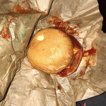 McDonald's - a half eaten sandwich wrapped in brown paper - Burgers Near Me - Independence, Missouri McDonald's - a half eaten sandwich wrapped in brown paper - Burgers Near Me - Independence, Missouri