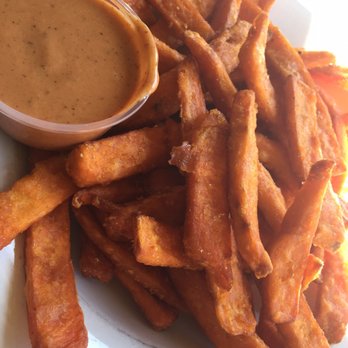 Anchor Grill - a plate of french fries with dipping sauce - Bars Near Me - Little Current, Ontario