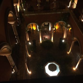 Casa del Poeta - Looking from above at the hotel courtyard at night - Hotels Near Me - Seville, SE
