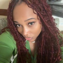 She used 100% human hair for the curly pieces  Med knotless