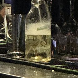 Mister East - This is the cleaning bottle she sprayed on my & another lady
