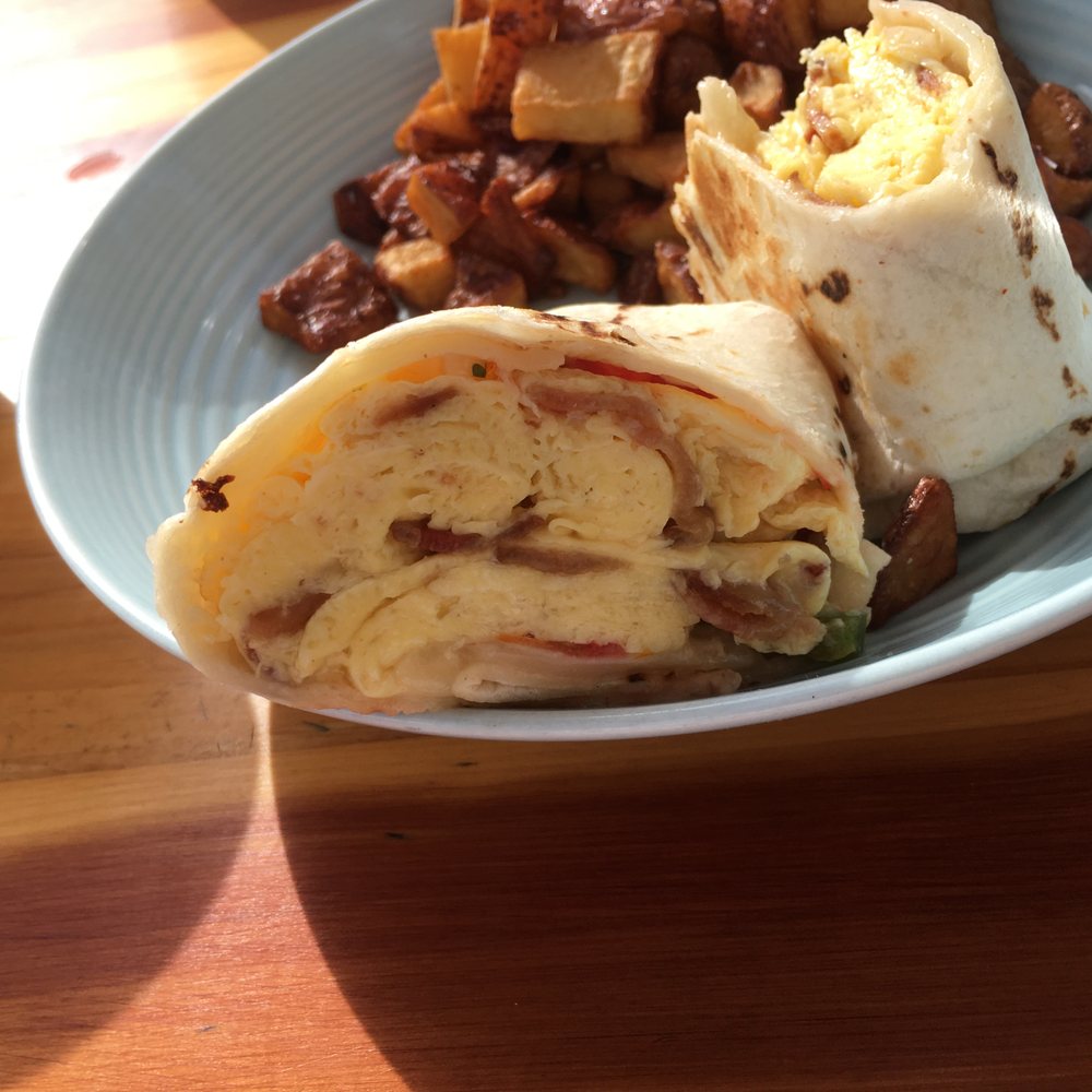 Breakaway Cafe - Bacon Avocado Burrito. $11 seemed steep but look at those eggs. Made me feel a little better. - Coffee & Tea Near Me - Chapel Hill, North Carolina