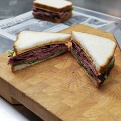 Magic City Cafe - Roast Beef and Cheddar - Sliced roast beef, sliced sharp cheddar cheese, romaine lettuce, aioli, signature beefeater dip on the side