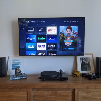 Pro TV Wall Mount Installation - Floating 50" TV installed on a swivel wall mount. Wires hidden in the wall for a clean finish. - TV Mounting Near Me - Hollywood, California