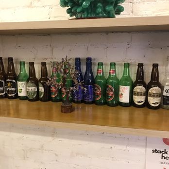Nan Xiang Express - Bottles on display! - Shanghainese Near Me - Brooklyn, New York