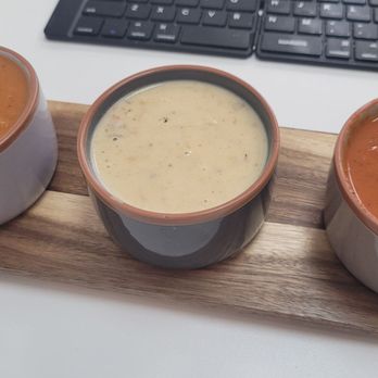 Soup Shop - West Melbourne - SOUP FLIGHT: From right to left, creamy garlic tomato soup, she-crab bisque, tomato soup. - Sandwiches Near Me - West Melbourne, Florida Soup Shop - West Melbourne - SOUP FLIGHT: From right to left, creamy garlic tomato soup, she-crab bisque, tomato soup. - Sandwiches Near Me - West Melbourne, Florida
