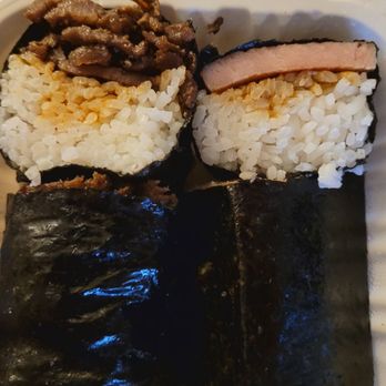 Ono Hawaiian BBQ - Sliced/side view of the 2 piece musubi for about $7+. I chose spam (right) and bbq beef (left). - Hawaiian Near Me - Alameda, California