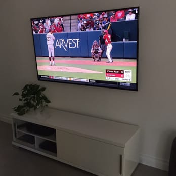 MVP - Mobile Video Plus - 75" TV hung with new electric outlet & cable run in-wall. - Home Theatre Installation Near Me MVP - Mobile Video Plus - 75" TV hung with new electric outlet & cable run in-wall. - Home Theatre Installation Near Me