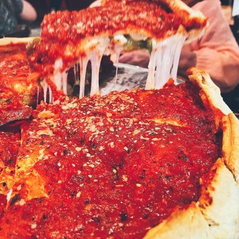 Giordano's - action shot - Pizza Near Me - Chicago, Illinois