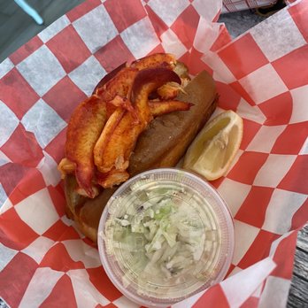 DJ’s Clam Shack - Full view hot lobster roll - Seafood Near Me - Huntington, New York DJ’s Clam Shack - Full view hot lobster roll - Seafood Near Me - Huntington, New York