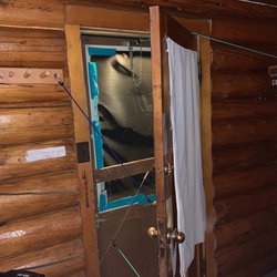 Branding Iron Inn - Screen door bungee corded and duct taped
