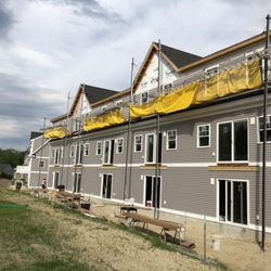 Ron and Brian’s Siding - Our commercial line of siding work. Working it from the ground up, one panel at a time, with great attention to detail. Dover, NH