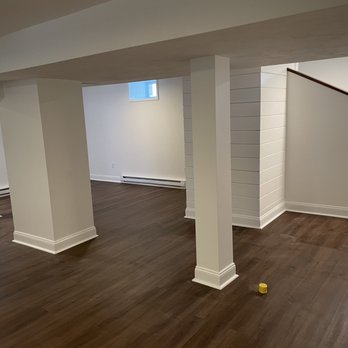 O'Sullivan Remodel - unfinished basement with wood floors - General Contractors Near Me O'Sullivan Remodel - unfinished basement with wood floors - General Contractors Near Me