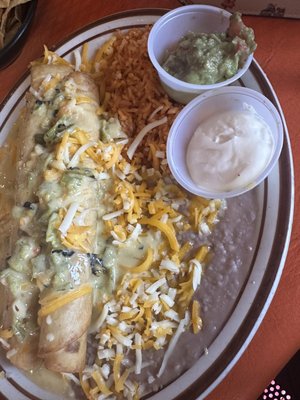 Photo of El Sombrero Patio Cafe - Las Cruces, NM, US. Flour flautas with Chile con queso smothered