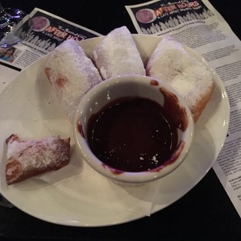 The Second City - Beignets are warm and soft. Can't go wrong with chocolate sauce. - Performing Arts Near Me - Chicago, Illinois