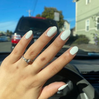 Nails by Ken - white gel manicure with chrome on one finger - Nail Salons Near Me - El Cerrito, California