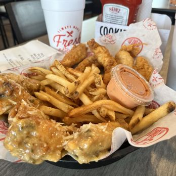 Slim Chickens - 5 & 5 entree = Five wings, five chicken tenders, and more than enough for fries for two people with one beverage included! - Southern Near Me - Tallahassee, Florida