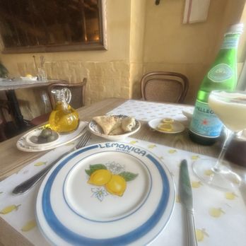 Lemonica - Table by the window - Wine Bars Near Me - Hollywood, Florida