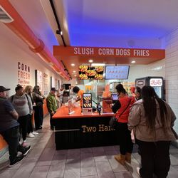 Two Hands Fresh Corn Dogs - This is the wait at this location... long long long long wait. The owners neeeeeeed to hire more people.