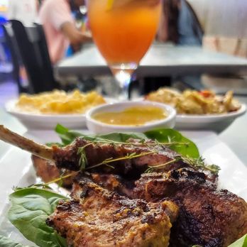 The Riviere - a plate of food and a glass of orange juice - Breakfast & Brunch Near Me - Richmond, Virginia The Riviere - a plate of food and a glass of orange juice - Breakfast & Brunch Near Me - Richmond, Virginia