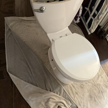 JG Plumbing & Rooter - Toilet gently placed on cloth to safe floor - Plumbing Near Me - Glendora, California JG Plumbing & Rooter - Toilet gently placed on cloth to safe floor - Plumbing Near Me - Glendora, California