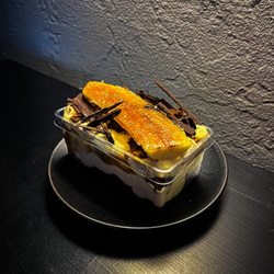 Big Boss Cafe - Banana Pudding. Toffee bananas, peanut butter cookie crumble, Ghirardelli chocolate with fresh banana.