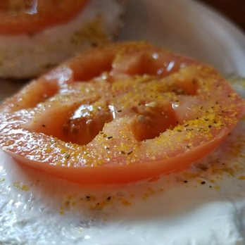 Rekindle Coffee - Close up of the tomato cream cheese lemon pepper bagel - Cafes Near Me - Orange, California
