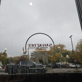Sawatdee - a view of a parking lot through a window - Thai Near Me - Bloomington, Minnesota Sawatdee - a view of a parking lot through a window - Thai Near Me - Bloomington, Minnesota