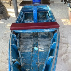 El Merkadito - Cool picnic tables made from old boats.