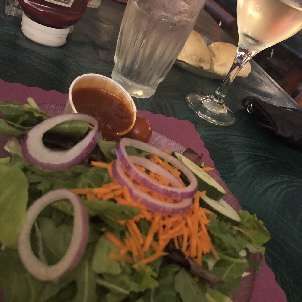 The Brownstone Inn - House salad with French dressing on the side. A glass of Arcturus to pair with my dinner. - American Near Me - Au Train, Michigan The Brownstone Inn - House salad with French dressing on the side. A glass of Arcturus to pair with my dinner. - American Near Me - Au Train, Michigan