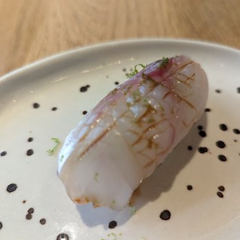 Youmiko Sushi Bar - First bite. European sea bass nigiri was served with overly warm rice. I didn't like it. - Sushi Bars Near Me - Kraków, Massachusetts