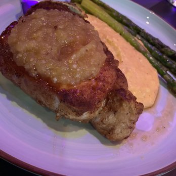 Bistro 71 - Pork chop, fruit compote, roasted tomato polenta, asparagus - French Near Me - Chambersburg, Pennsylvania Bistro 71 - Pork chop, fruit compote, roasted tomato polenta, asparagus - French Near Me - Chambersburg, Pennsylvania