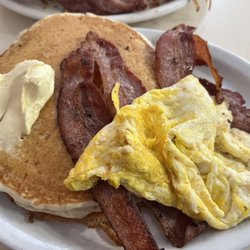 Ho Ho Kafe - 2 huge fluffy pancakes, 2 eggs , 4 thick slices of bacon $10 Hot Chocolate $2