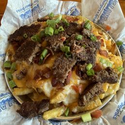Happy Hour Fries with a chopped burger patty and bacon on top!