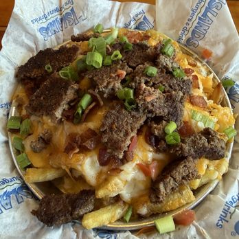 Islands Restaurant - Happy Hour Fries with a chopped burger patty and bacon on top! - Burgers Near Me - Fullerton, California