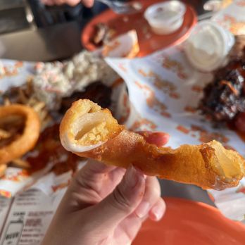 Phil's BBQ - Colossal onion ring inside - Barbeque Near Me - San Diego, California Phil's BBQ - Colossal onion ring inside - Barbeque Near Me - San Diego, California